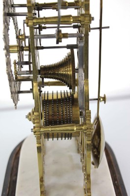 Lot 78 - A late 19th century brass skeleton clock...