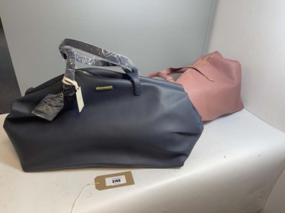 Lot 3768 - 2x Katie Loxton large duffel bags in pink & blue