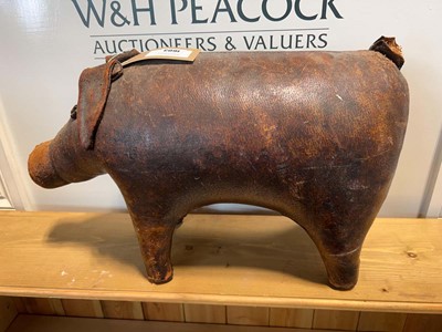 Lot 1603 - Vintage leather covered pig footstool, in the...