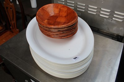 Lot 133 - Shelf of plastic platters and wooden serving...
