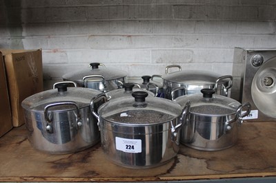 Lot 224 - 7x various sized twin-hammer pots with lids