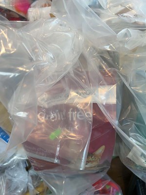 Lot 2229 - A bag containing a selection of cat food to...