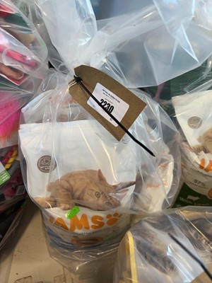 Lot 2230 - A bag containing a selection of cat food to...