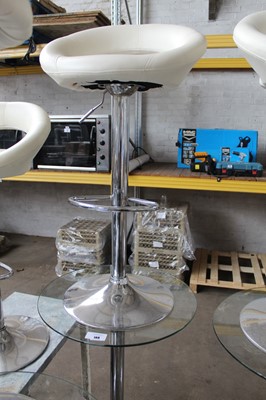 Lot 188 - Glasstop circular poseur table with 2 cream...