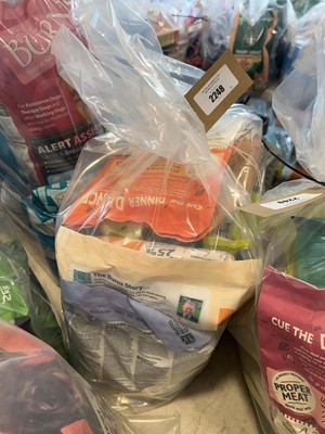 Lot 2248 - A bag containing a selection of dog food to...