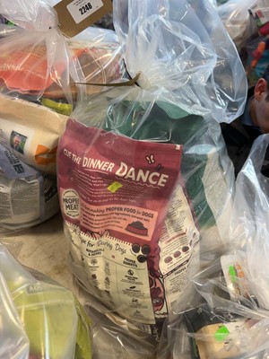 Lot 2249 - A bag containing a selection of dog food to...