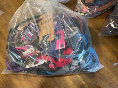 Lot 2264 - A bag containing a selection of dog leads &...