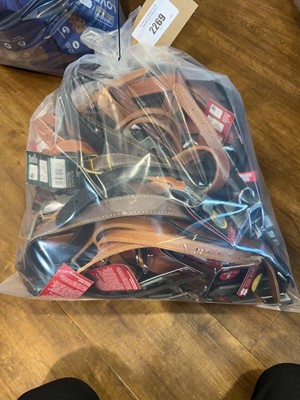Lot 2269 - A bag containing a selection of leather dog...