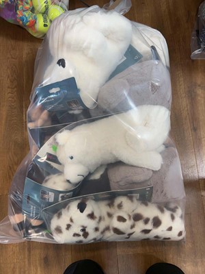 Lot 2280 - A bag containing a selection of dog toys by...
