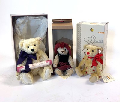 Lot A collection of three boxed Steiff bears,...