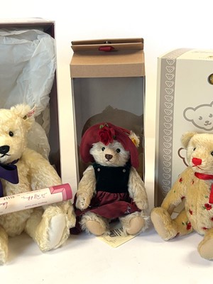 Lot A collection of three boxed Steiff bears,...
