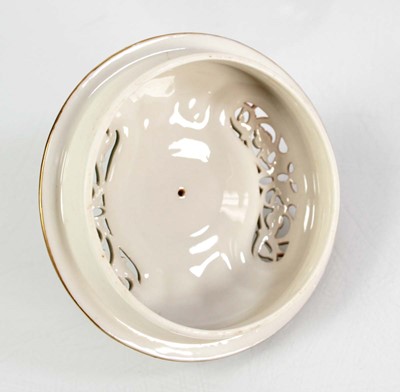 Lot 155 - A Royal Worcester ewer of squat form decorated...