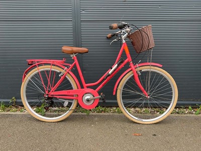 Lot 4039 - Compass step through bike in pink with basket