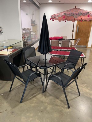 Lot 4163 - Black four seater square topped table on black...