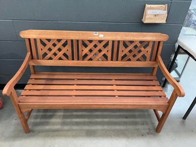 Lot 4173 - Hardwood three seater garden bench