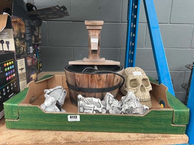 Lot 4112 - Crate of decorative items to include skulls,...