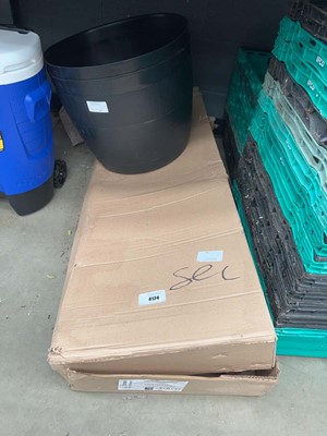 Lot 4124 - 2 black plastic planters and a boxed flatpack...