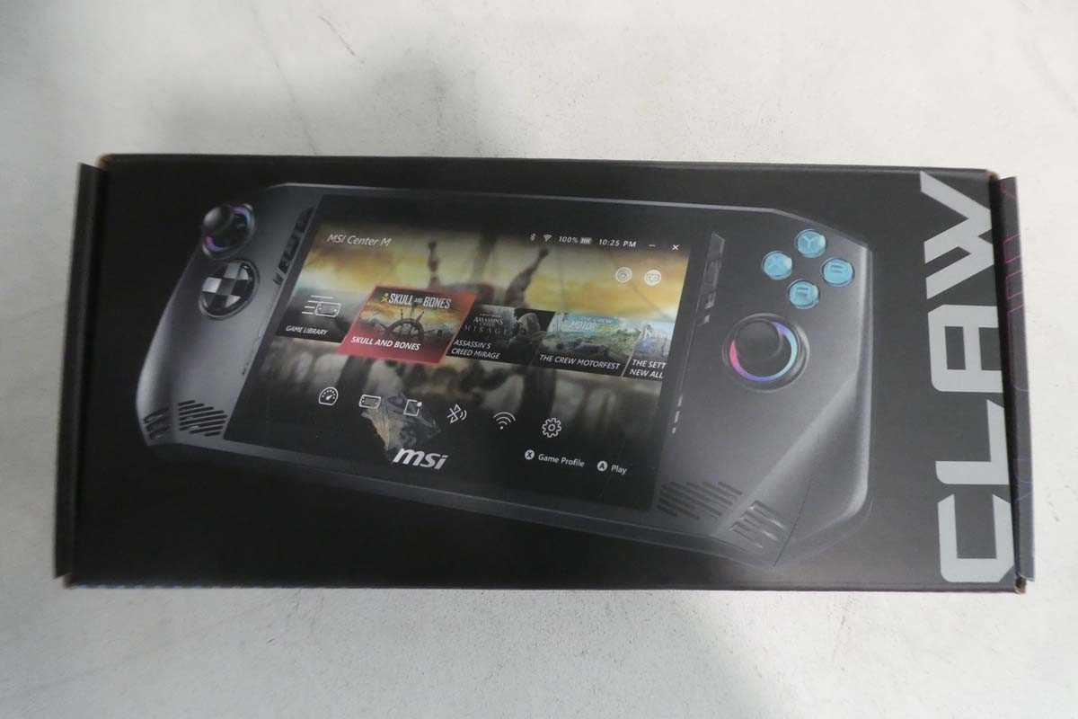Lot 1129 - MSI Claw A1M-016UK handheld gaming device,...