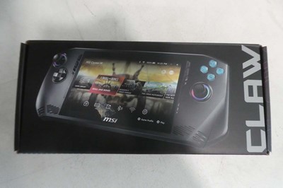Lot 1129 - MSI Claw A1M-016UK handheld gaming device,...