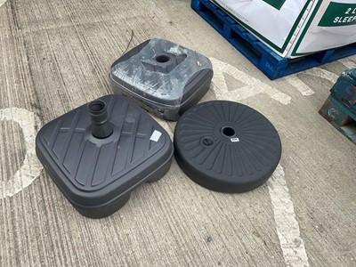 Lot 4240 - Three plastic umbrella stands