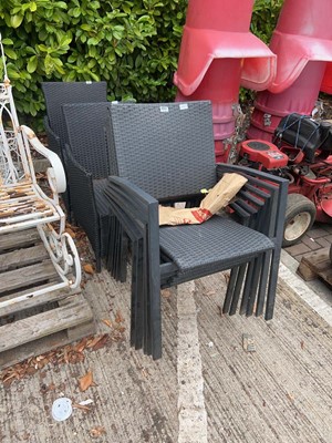 Lot 4257 - Eight black wicker effect garden chairs