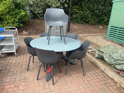 Lot 4265 - Glass topped circular garden table on grey...