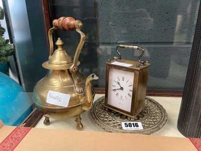 Lot 5016 - Carriage time piece, trivet and kettle