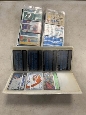 Lot 2150 - Two folders containing various phone cards