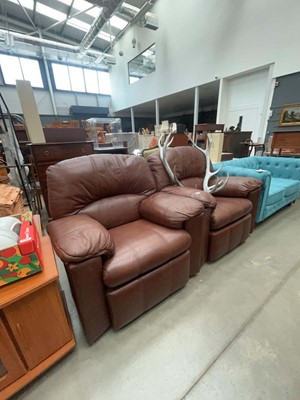 Lot 5139 - Pair of brown leather effect lounge armchairs