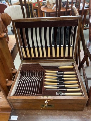 Lot 5077 - Oak cased cutlery canteen with campaign handles