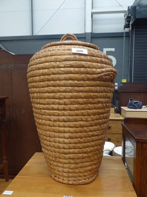 Lot 5274 - Woven laundry basket and cover