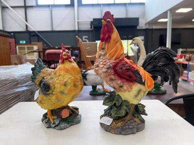 Lot 5200 - Pair of resin figures of cockerels