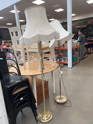 Lot 5203 - Brass and onyx floor lamp on claw feet...