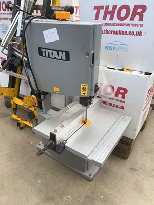 Lot 4489 - Titan bench-mounted 240v band saw and a stand