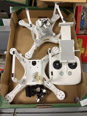 Lot 2267 - Box containing two DJI drones and controller