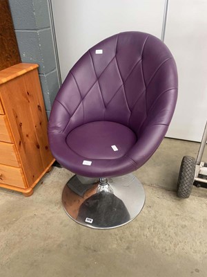 Lot 5318 - Contemporary purple swivel lounge chair