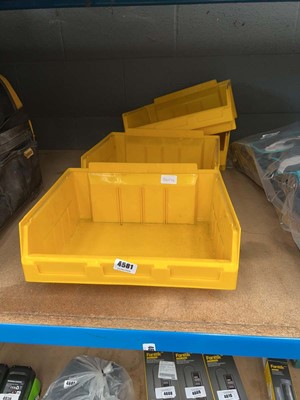 Lot 4581 - Four yellow lin bins