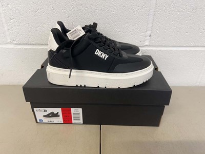 Lot 1818 - Boxed pair of DKNY lace up trainers size UK 4