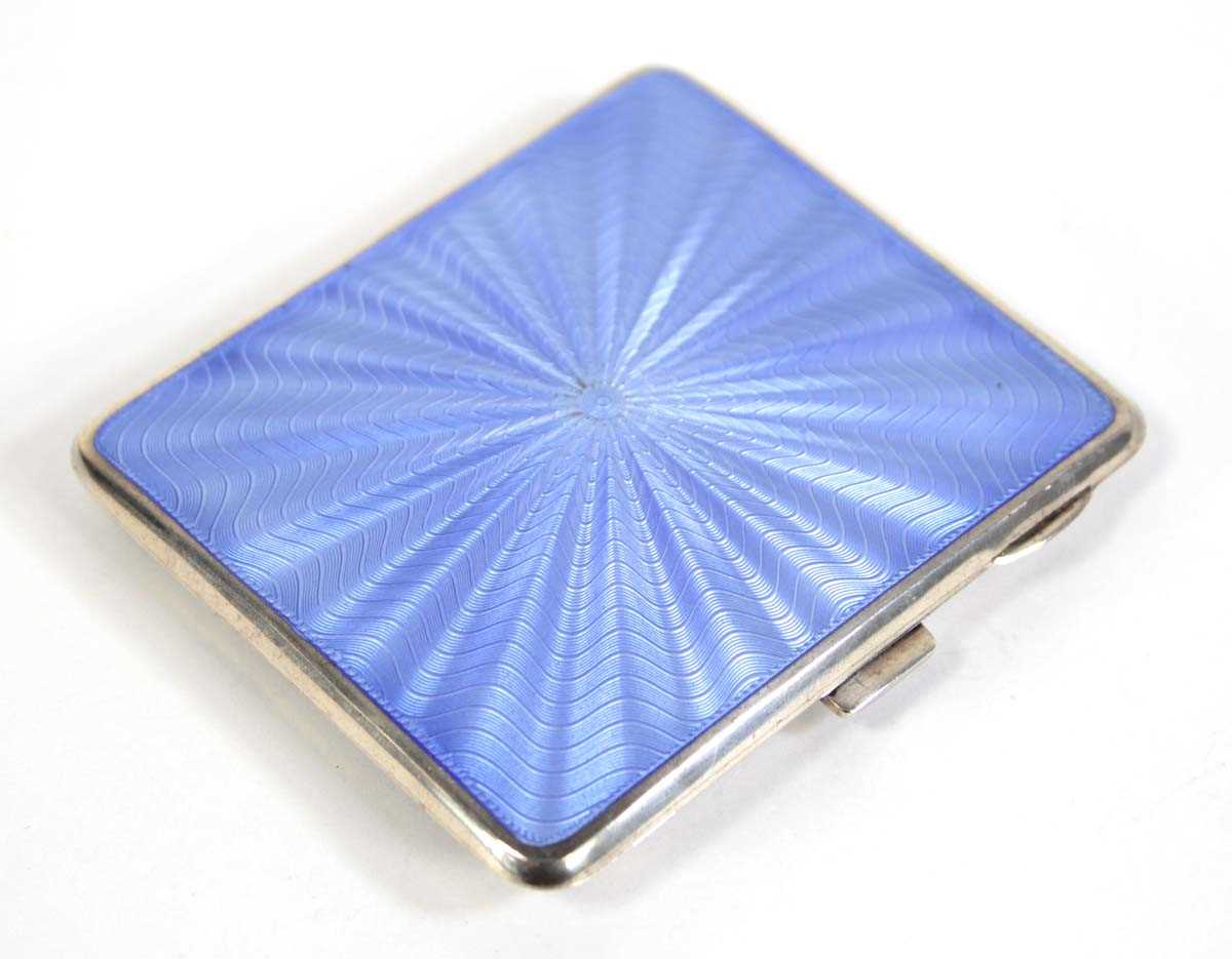 Lot 273 - A silver, parcel gilt and pale blue guilloche...