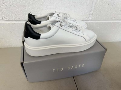 Lot 1824 - Boxed pair of Ted Baker trainers size UK 7