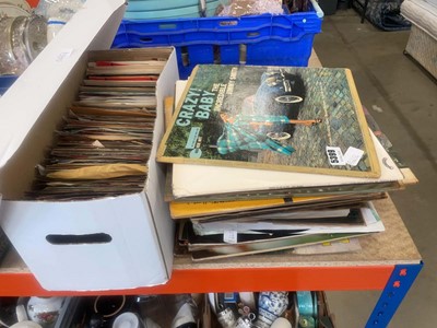 Lot 5399 - Tray of singles together with a stack of vinyl...