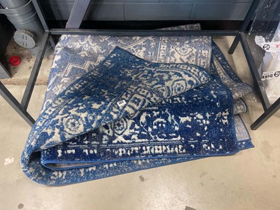 Lot 5471 - Large blue rug