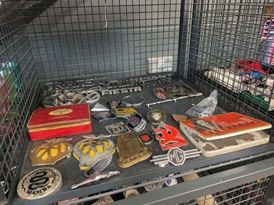 Lot 5496 - Cage containing car badges and tins