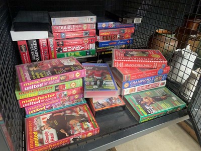 Lot 5534 - Cage containing footballing videos