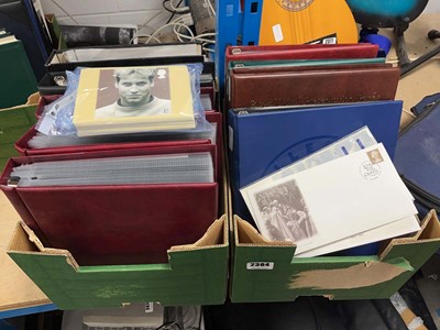 Lot 2384 - Two boxes containing nine albums of first day...