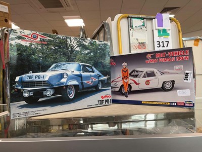 Lot 2494 - 2 vintage Japanese model kits, a MAT vehicle...