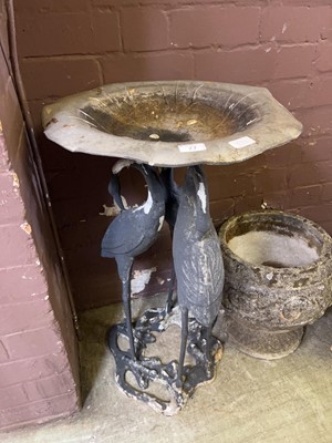 Lot 27 - A metalwork birdbath with column modelled as...