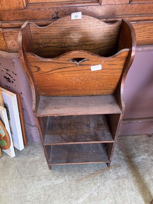 Lot 46 - An oak magazine rack and open bookcase