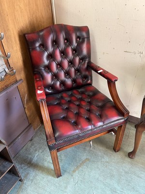 Lot 48 - A button upholstered club armchair