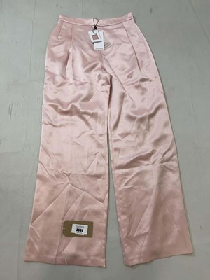 Lot 3699 - Nadine Merabi baby pink satin look tailored...